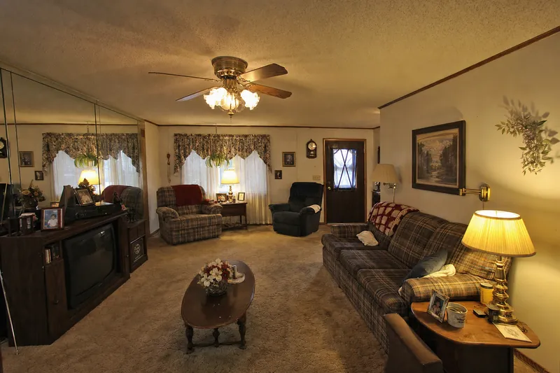 Dated closed-off living room before gut renovation in Queens